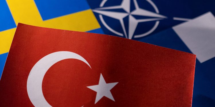 NATO, Turkish, Swedish and Finnish flags are seen in this illustration taken May 18, 2022. REUTERS/Dado Ruvic/Illustration