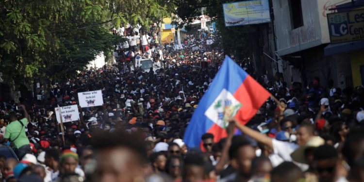 Protesters march during a demonstration called by artists to demand the resignation of Haitian president Jovenel Moise, in the streets of Petion Ville, Port-au-Prince, Haiti October 13, 2019. REUTERS/Andres Martinez Casares - RC1C28637CD0
